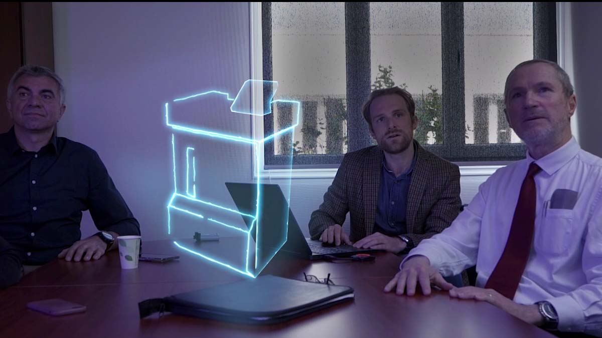 Trois hommes en réunion autour d'une image holographique représentant un self de restauration